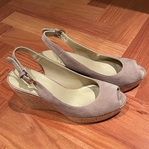 Stuart Weitzman size 7 peep toe wedge heel. About 3 inch heel